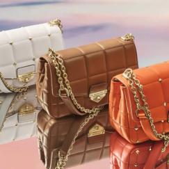 Three purses on mirror